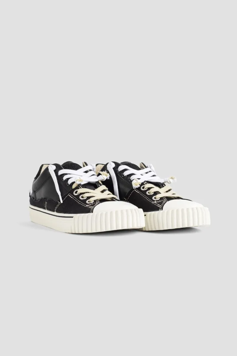 Baskets New Evolution noires et blanches