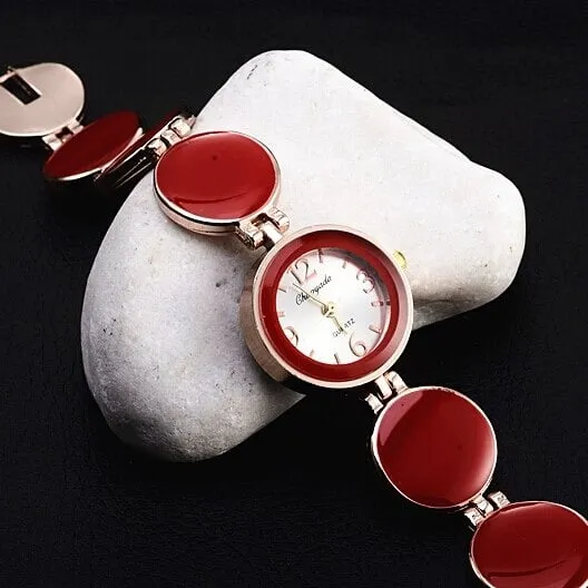 Montre bracelet rond vintage à quartz pour femmes rouge • Vintage Univers