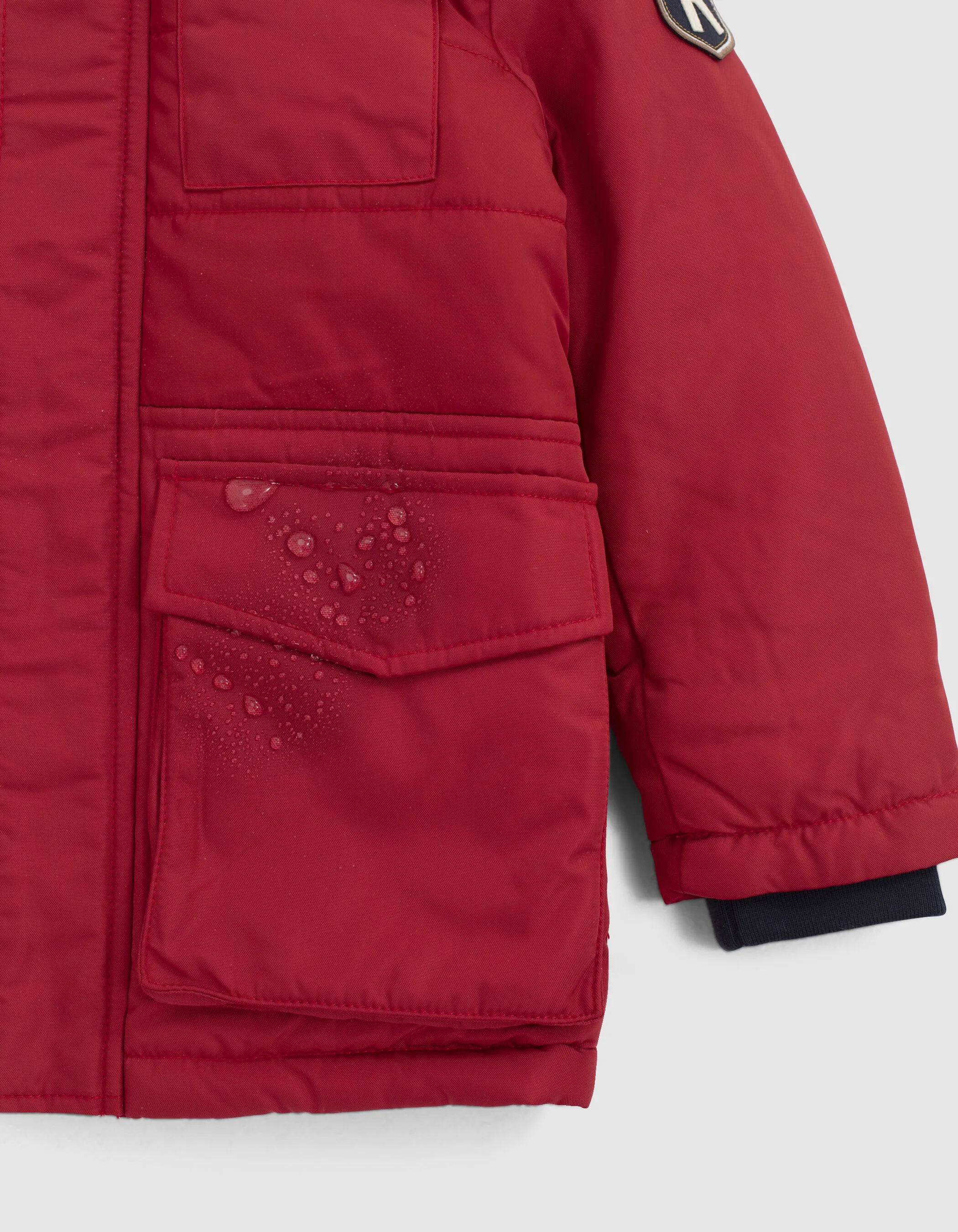 Parka rouge à capuche fourrée garçon