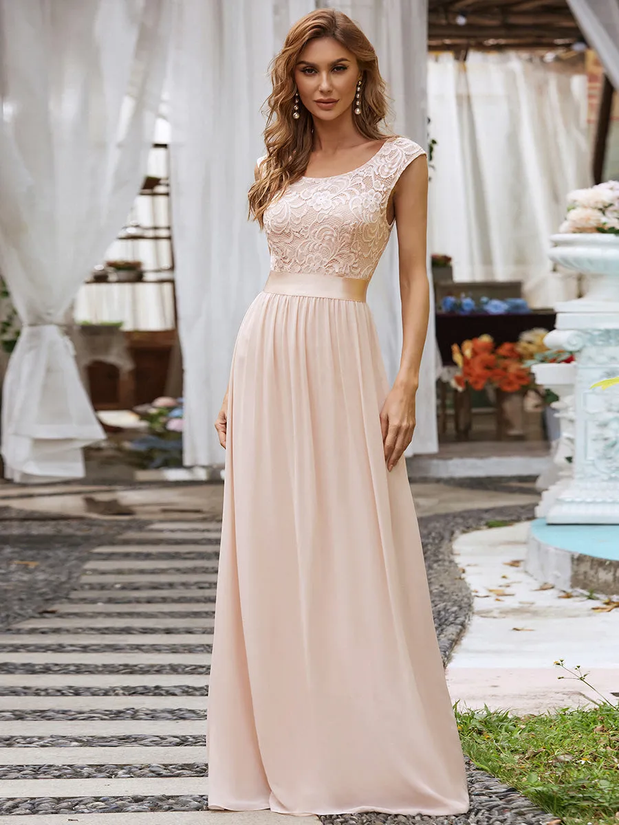 Robe mariage invitée longue en dentelle sans manches