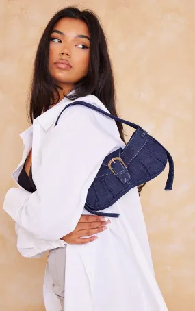 Sac à main en jean bleu à détail boucle et coutures